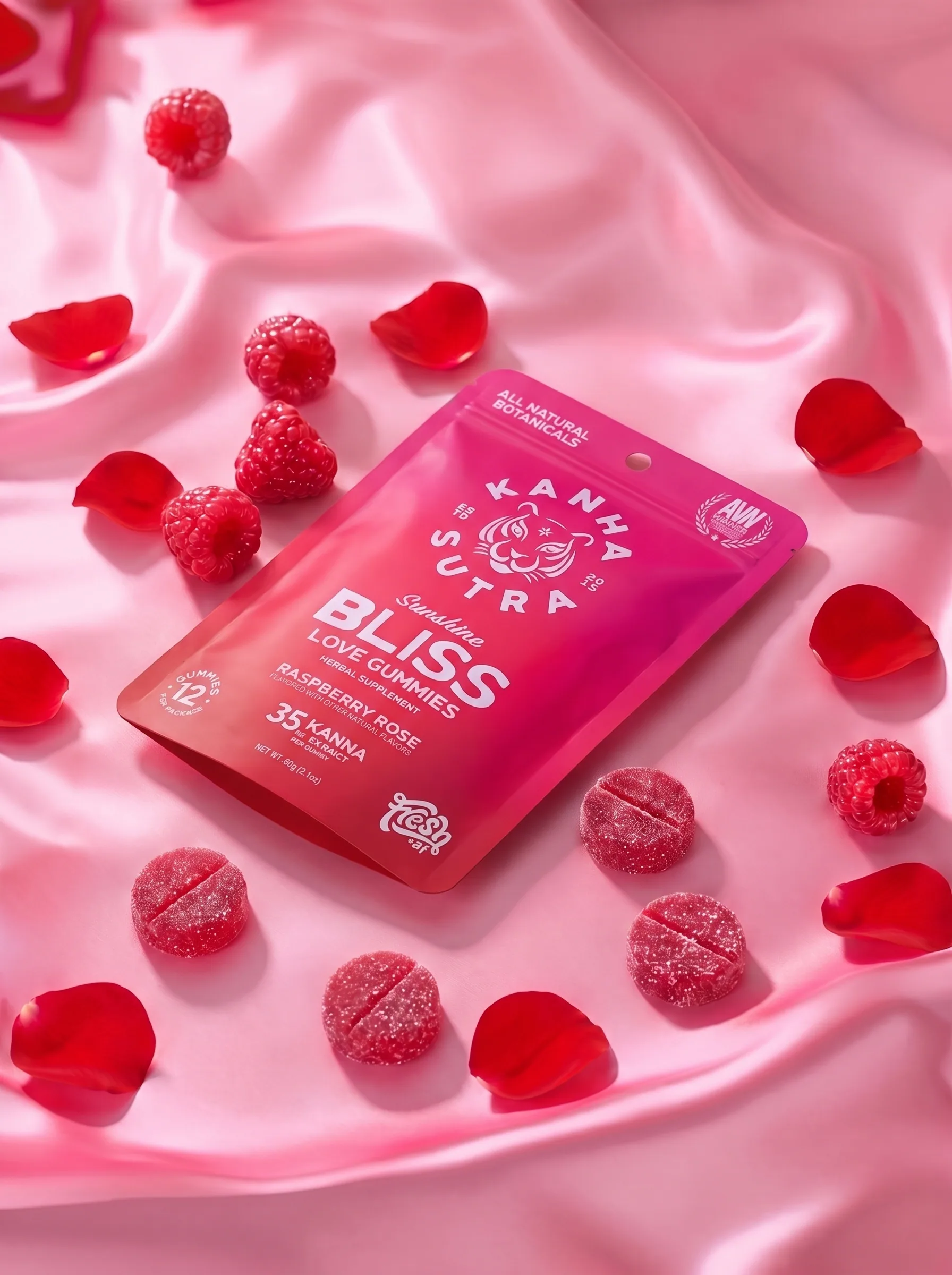 Sunshine Bliss gummies and pack on pink silk